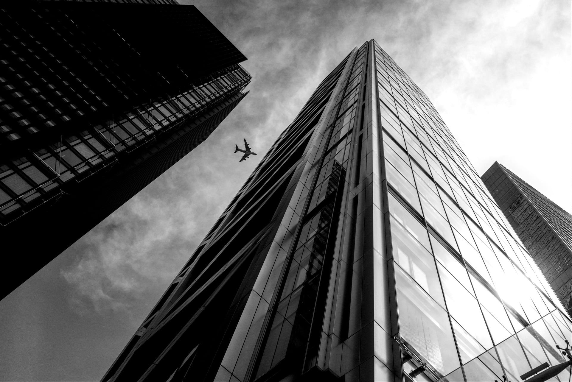 Modern glass office buildings in London viewed from street level